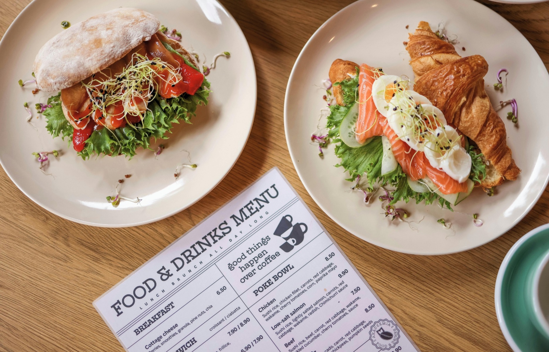 Restaurant operator reviewing menu data and financial reports — understanding GLP-1's impact on category mix and check averages requires looking at POS data at the item and daypart level
