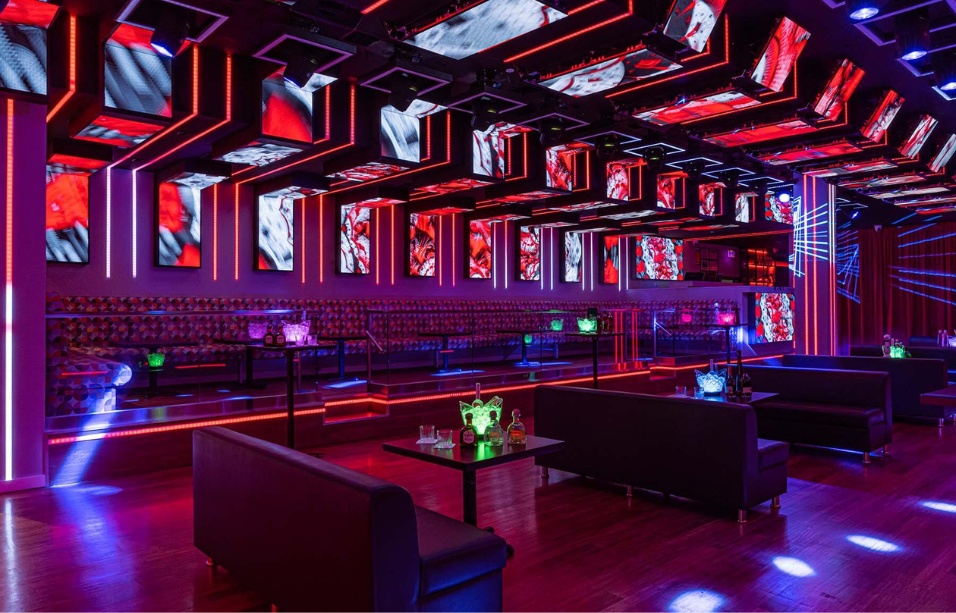 Custom commercial furniture installation showcasing dual-purpose dining and nightclub setup at Agenda NYC Queens