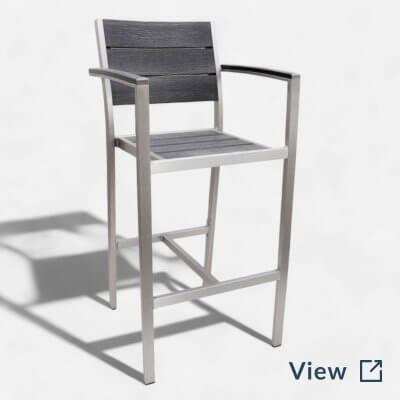 Weather-resistant commercial bar stool with pewter synthetic teak slats and aluminum frame for indoor-outdoor restaurant use