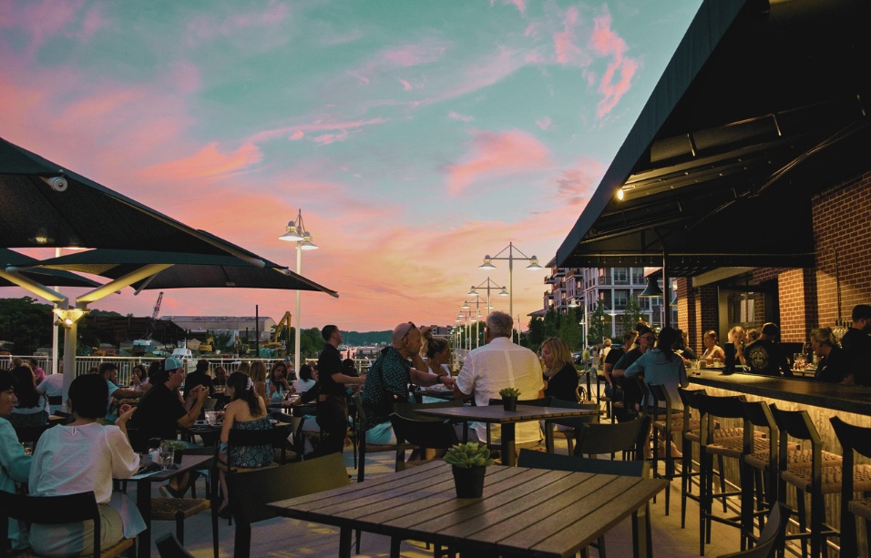 Garvies Point Brewery outdoor seating at sunset with vibrant sky