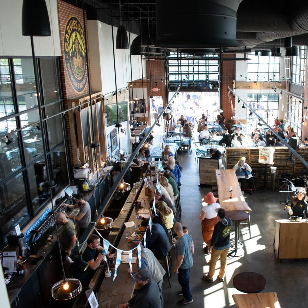 Commercial bar seating with industrial design at Garvies Point Brewery in Long Island