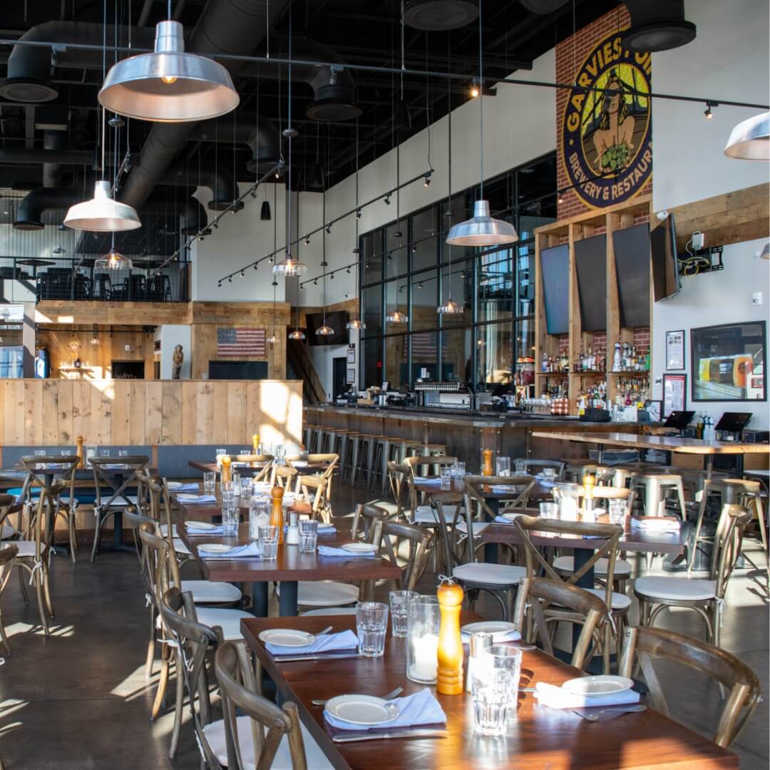 Custom industrial furniture installation in bar area of Garvies Point Brewery, Long Island