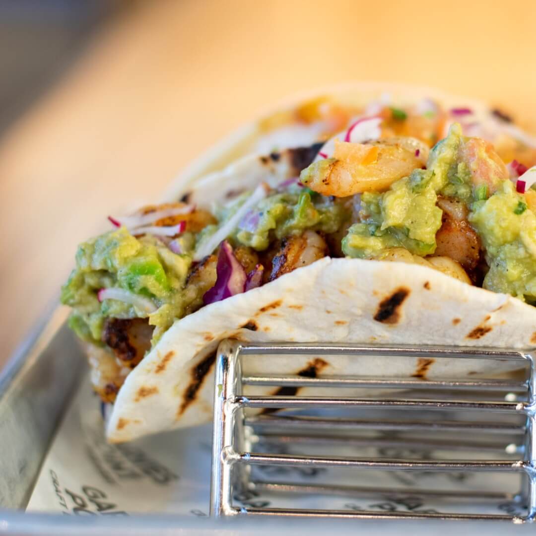 Shrimp taco with guacamole at Garvies Point Brewery, crafted for an industrial dining setting