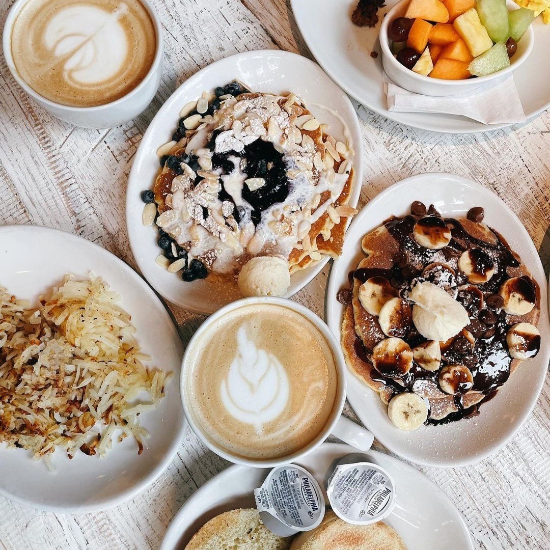 Breakfast service setup with custom commercial tables at Honey Berry Café