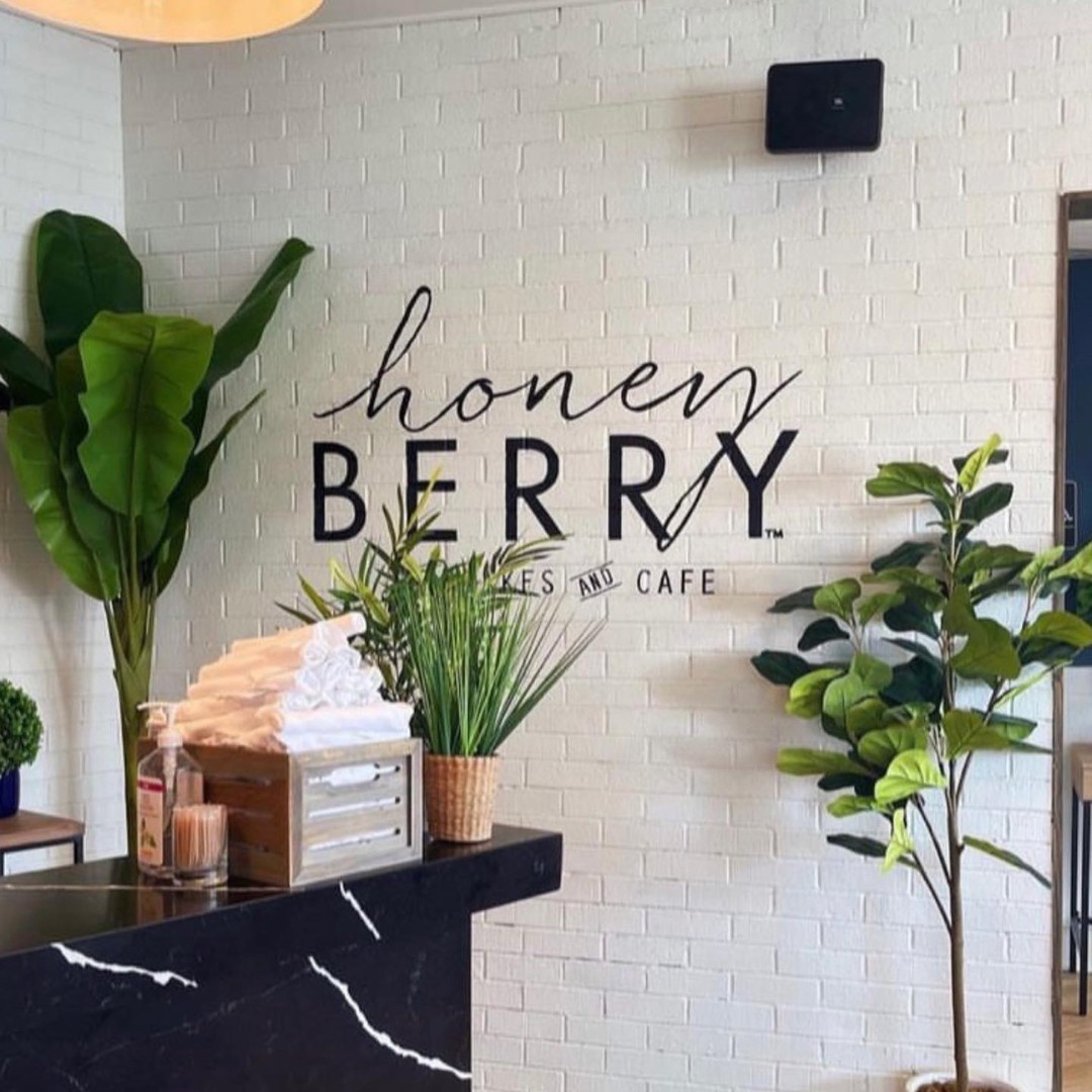 Commercial restaurant entrance design at Honey Berry Café featuring custom furniture