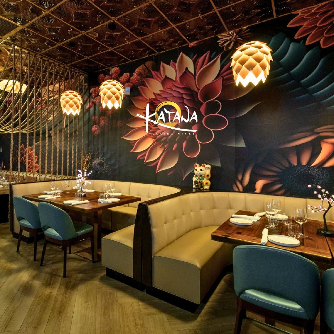 Restaurant booth seating at Katana Cocina Nikkei Sushi in Weston, Florida, with Japanese-Peruvian inspired design